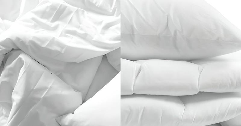 Một người đàn ông đang lau sạch chiếc túi đồ nghề màu đen bằng khăn ẩm sau khi sử dụng, thể hiện sự cẩn thận trong việc bảo quản dụng cụ làm việc.