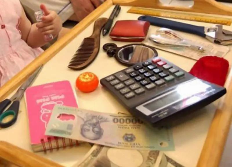 Chọn nghề cho bé trong tiệc thôi nôi