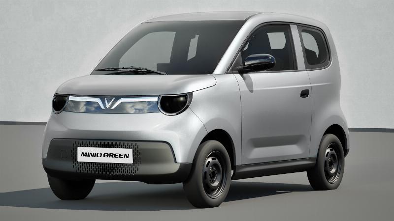 Hinh anh minh hoa nguoi ban dang tu van cho khach hang ve cac model xe nang mini khac nhau